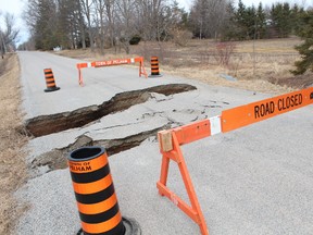 A sinkhole has opened up on Chantler Rd., west of Cream St. in Pelham.
(MARYANNE FIRTH/Tribune Staff)