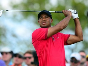 Tiger Woods tees off from the fourth hole during the final round of the WGC - Cadillac Championship golf tournament at TPC Blue Monster at Trump National Doral last month. (Andrew Weber-USA TODAY Sports)