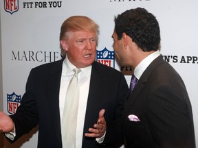 Donald Trump and Philadelphia Eagles quarterback Mark Sanchez chat at an NFL event in this 2012 file photo. (WENN.com)