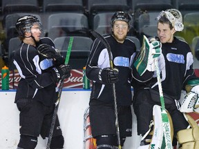 Brett Welychka, Dakota Mermis and Anthony Stolarz chat during London Knights practice in at Budweiser Gardens. (Free Press file photo)