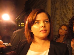Laura Miller speaks to reporters after testifying at a gas plant committee hearing in Ontario on Aug. 6, 2013.
(FILE PHOTO/QMI AGENCY)