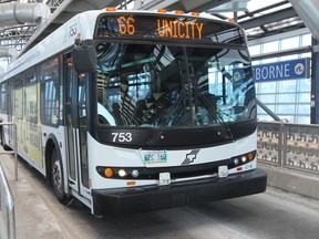 A Winnipeg Transit bus makes its way through the Osborne Rapid Transit station last week. (Brian Donogh/Winnipeg Sun file photo)