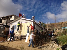 Photo supplied
The crew painting and roofing the new house in Tijuana, Mexico. Adam and Ralph Herold, owners of Brown's Concrete in Sudbury, travelled south to Mexico along with six other companies to participate in a venture organized by Homes of Hope and Youth With A Mission in Tijuana to build a house for a family in need.