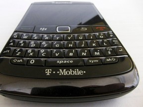A T-Mobile branded BlackBerry smartphone is pictured in Hoboken, N.J., March 20, 2011. REUTERS/Gary Hershorn