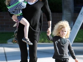 Marcia Cross out and about with her daughters Eden and Savannah in Brentwood
Los Angeles in 2010. She gave birth to twins at the age of 44.(WENN)