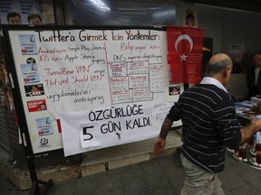 A board shows alternative ways to access Twitter, is placed at an election campaign office of the main opposition Republican's People's Party (CHP) in Istanbul March 25, 2014. REUTERS/Murad Sezer