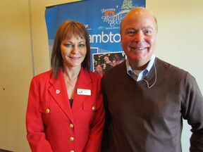 Marlene Wood, general manager of Tourism Sarnia Lambton, stands next to Roger Brooks, a destination marketing expert who was the keynote speaker at Wednesday's Lambton County Tourism Summit held at Lambton College's Event Centre. It attracted approximately 50 tourism and community leaders from across the community who heard about efforts and strategies to attract visitors. (PAUL MORDEN, The Observer)