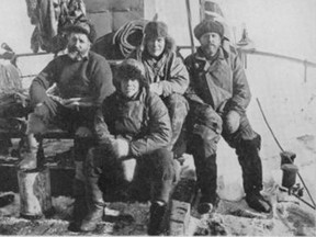 Image of Thomas MacLeod on left, with three members aboard Shackleton’s ship, Endurance.