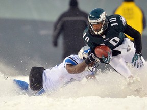 Philadelphia Eagles wide receiver DeSean Jackson (10) returns a punt return against the Detroit Lions during the fourth quarter action in the snow and blizzard at Lincoln Financial Field on Dec 8, 2013 in Philadelphia, PA, USA. (Jeffrey G. Pittenger/USA TODAY Sports)