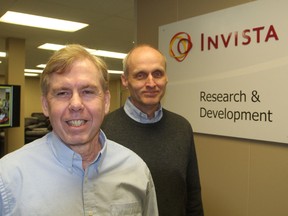 Invista global technical director Tim Donovan, left, and site manager Steve Kimpton are impressed with the expertise of the city's three robotics teams. Invista is a major supporter of the teams.
Michael Lea The Whig-Standard