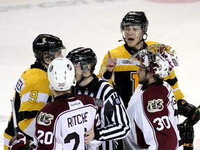 A bloodied Kingston Frontenacs’ Sam Bennett yells at Peterborough Petes’ Nick Ritchie after the Petes won in overtime, on Ritchie’s goal, in Game 7 of an Ontario Hockey League Eastern Conference quarter-final series at the Rogers K-Rock Centre on Tuesday night. The Petes will face the Frontenacs on Sept. 25 at the Memorial Centre in the 2014-15 season home opener. Ian MacAlpine/Kingston Whig-Standard/QMI Agency file photo