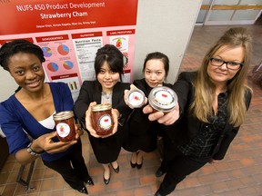 The makers of the Strawberry Cham team, (from left to right) Aimee Kapeta, Jiayue Chen, Nian Liu and Kristy Vest hold their product at the University of Alberta in Edmonton, Alta., on Wednesday, April 2, 2014. They made the product for their class. Ian Kucerak/Edmonton Sun/QMI Agency