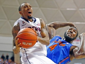 Connecticut Huskies’ Ryan Boatright against Florida’s Patric Young when the two teams met in early December. (AFP)