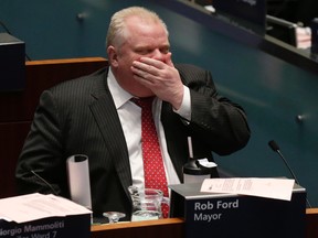 Mayor Rob Ford says he was too quick on the draw when he voted against honouring Nelson Mandela and Canadian Olympic athletes on Wednesday. (MICHAEL PEAKE/Toronto Sun)