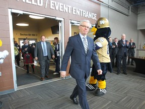 Premier, Greg Selinger, seen here arriving last week at a Grey Cup news conference, has the lowest approval rating of any premier in Canada, according to a new poll. (FILE PHOTO)