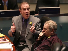 Deputy Mayor Norm Kelly gives thumbs up after the BMO field vote in council chambers on Thursday. (CRAIG ROBERTSON/Toronto Sun)