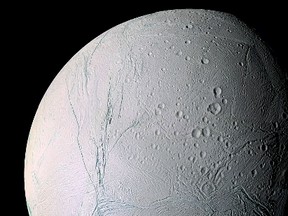 This March 9, 2006 NASA Cassini space probe mosaic image shows Saturn's moon Enceladus. Saturn's moon Enceladus is home to an ocean of melted water beneath its surface, and could be a source for alien microbes, scientists said on April 2, 2014. (AFP PHOTO / HANDOUT / NASA / JPL)