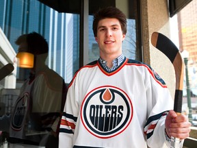 Jeff Butler poses for a photo in downtown Edmonton, Alta., on Thursday, April 3, 2014. Butler won an Edmonton Oilers look-a-like contest sponsored by the Edmonton Sun. He won a tour of Rexall Place and two signed Oilers jerseys. Ian Kucerak/Edmonton Sun