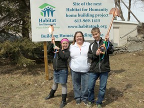 Connie Matthews along with her two children, Cole, 12, and Hannah, 10, were on hand to see the shovels go into the ground at the site where their brand new home will stand completed by summer’s end.