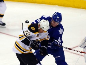 Maple Leafs' Cody Franson battles Shawn Thornton of the Boston Bruins on April 3. (Michael Peake, Toronto Sun)