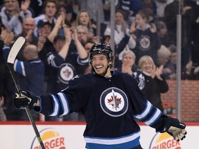 Zach Redmond celebrates scoring his second career NHL goal Thursday night at MTS Centre, during the Jets 4-2 loss to the Pittsburgh Penguins.