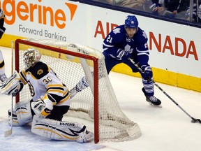 Maple Leafs’ James van Riemsdyk moves in on Bruins goalie Chad Johnson during Thursday's game in Toronto. (MICHAEL PEAKE/TORONTO SUN)