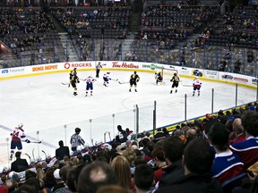 Plenty of empty seats are seen as the crowd looks on during the second period of the Edmonton Oil Kings' WHL playoff hockey game against the Brandon Wheat Kings at Rexall Place in Edmonton, Alta., on Thursday, April 3, 2014. Codie McLachlan/Edmonton Sun/QMI Agency