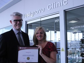 Dr. Keith McNicol, the chair of the Westview PCN and Melanie Saunders, the clinic manager for Meridian Medical, display their accreditation award that they were recently presented with. - Karen Haynes, Reporter/Examiner