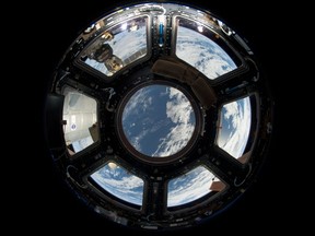 This NASA photo obtained June 18, 2013 shows a view of Earth as seen from the Cupola on the Earth-facing side of the International Space Station. (NASA/HO)