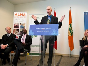 Prof. Ruurd Zijlstra with the Animal Nutrition and Ingredient Development Program, speaks at the University of Alberta's Agri-Food Discovery Place building in Edmonton, Alta., on Friday, April 4, 2014. Federal funding of $1.6 million was announced at the event, which will be used by the U of A's Faculty of Agricultural, Life, and Environmental Sciences to purchase pilot-sized specialized extrusion equipment. Ian Kucerak/Edmonton Sun/QMI Agency