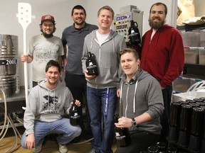 Clockwise from left, Refined Fool Brewing Co.'s Dallas Willms, Tony Alexander, Brandon Huybers, Nathan Colquhoun, Bill Bradshaw, and Matthew Barnes. Not pictured are Josh Woodham, Aaron Robb, Chad Ouellette, and Daniel Slade. The downtown Sarnia brewery is set to open next month. (TYLER KULA, The Observer)