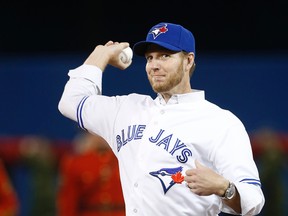 Roy Halladay throws out the first pitch at the Blue Jays home opener on April 4. (Craig Robertson, Toronto Sun)