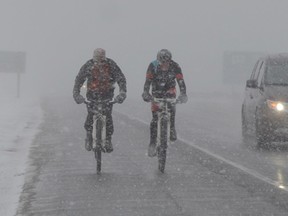 Mary Katherine Keown/For The Sudbury Star
Charles Dumas and Rob Rice ride tandem on the paved shoulder of the southwest bypass near Hannah Lake.