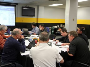 Members of the Sarnia Sting scouting team, coaching staff, and management converged on the RBC Centre media room for the 2014 OHL Priority Selection. The "War Room" saw the group of hockey minds debate players ahead of their 16 choices on the day. SHAUN BISSON/THE OBSERVER/QMI AGENCY