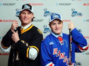 First pick Jakob Chychrun (left), a 6-foot-2 defenceman, and second pick Adam Mascherin, 5-foot-9 centre, were all smiles Saturday at the OHL entry draft. (CHL Images)