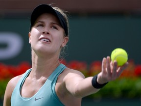 Eugenie Bouchard serves during her match against Simona Halep in the BNP Paribas Open at the Indian Wells Tennis Garden. (Jayne Kamin-Oncea/REUTERS/FILE PHOTO)