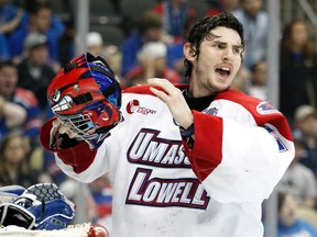Connor Hellebuyck is forgoing his final two years of eligibility at UMass-Lowell to turn pro. He will report in the next few days to the St. John's IceCaps. (Justin K. Aller/Getty Images/AFP File)