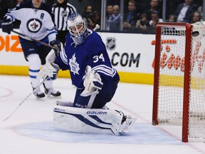Toronto Maple Leafs goaltender James Reimer (34) defelcts a shot by the Winnipeg Jets wide of the net during the second period at the Air Canada Centre. (John E. Sokolowski-USA TODAY Sports)