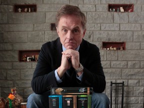 University of Ottawa professor David Sweanor poses for a photo at his home in Ottawa On. Thursday March 27, 2014. David is in favor of E-cigarettes and will lobby for their use in Canada.  
Tony Caldwell/Ottawa Sun/QMI Agency