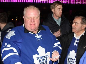 Mayor Rob Ford and Councillor Frank DiGiorgio, far right, at the Leafs game on April 5. (JOE WARMINGTON/Toronto Sun)
