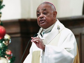 Roman Catholic Archbishop of Atlanta Wilton Gregory speaks to parishioners in Atlanta, Georgia, in this file photo taken December 5, 2013. Gregory, who has been criticized for lavish spending of church money, on April 5, 2014, said he has decided to sell the $2.2 million mansion he has been using as his official residence. REUTERS/Tami Chappell/Files