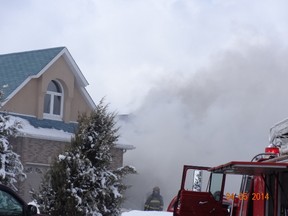 Firefighters were on scene in Garson for several hours Saturday, battling a house fire which caused $400,000 in damage. Carina Brisebois/For The Sudbury Star