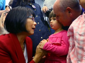 Mayoral candidate Olivia Chow speaks with supporters at her campaign office on Sunday. (DAVE ABEL, Toronto Sun)