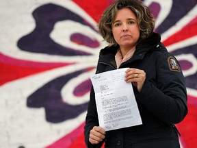 Eva Cooper, owner of Delilah's, is photographed outside her Glebe location in Ottawa on Thursday February 27, 2014. The Quebec government is asking her to shut down her mostly english Facebook page as she also has a store location in Chelsea, QC. Darren Brown/Ottawa Sun/QMI Agency