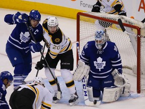 Maple Leafs goaltender Jonathan Bernier had a .923 save percentage on the season when he was pulled out of Thursday’s game against the Boston Bruins with a knee injury. (Michael Peake/Toronto Sun)