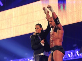 Triple H and the WWE's Stephanie McMahon are pictured at WrestleMania 30 on Sunday night. (PARKER WATERS PHOTO)