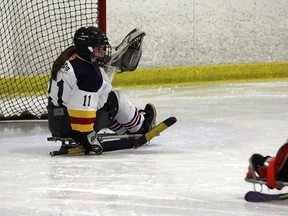 Megan Rivait, goalie for the Sarnia Junior Ice Hawks Sledge Hockey Team, holds the fort in helping her team win gold at the Ontario Championships in North Bay this past weekend. Sarnia won 12-2 in the final. (SUBMITTED PHOTO)