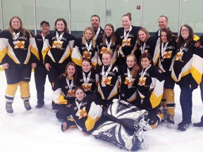 Members of the Mitchell Bantam girls hockey team celebrates their silver medal from their league tournament March 30th. SUBMITTED PHOTO