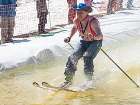 London Ski Club?s annual Slush Bowl and Puddle Jump event, which is open to boarders and skiers of all ages and genders, brought out many hopefuls who tried to make it across the man made "puddle.? (MARK SPOWART, The London Free Press)