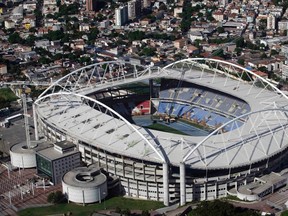 An aerial shot shows the Olympic Stadium, which is closed for repair works on its roof, in Rio de Janeiro March 28, 2014. Rio de Janeiro will host the 2016 Olympic Games. (REUTERS/Ricardo Moraes)